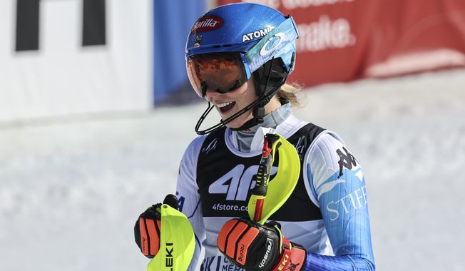 United States&#x27; Mikaela Shiffrin gets to the finish area after completing the women&#x27;s World Championship slalom, in Meribel, France, Saturday Feb. 18, 2023. (AP Photo/Marco Trovati)