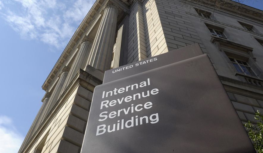 Caption: The exterior of the Internal Revenue Service (IRS) building in Washington. (AP Photo/Susan Walsh, File)