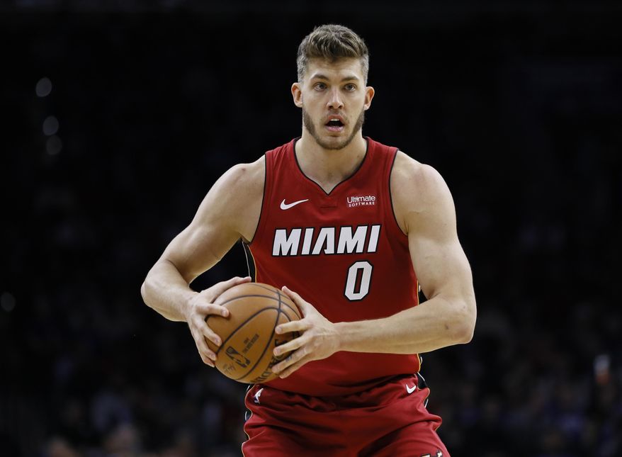 Miami Heat&#x27;s Meyers Leonard plays during an NBA basketball game against the Philadelphia 76ers, Wednesday, Dec. 18, 2019, in Philadelphia. Meyers Leonard is getting another chance at the NBA, nearly two years after he used an anti-Semitic slur while playing a video game that was being livestreamed. A person with knowledge of the negotiations said Leonard and the Milwaukee Bucks have agreed on a 10-day contract, Monday, Feb. 20, 2023. (AP Photo/Matt Slocum, File)