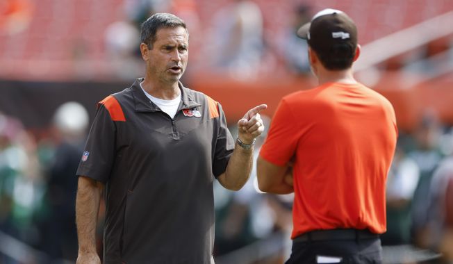 Cleveland Browns special teams coach Mike Priefer, left, talks with head coach Kevin Stefanski during warm ups before an NFL football game against the New York Jets, Sunday, Sept. 18, 2022, in Cleveland. Browns special teams coordinator Mike Priefer has been fired, Tuesday, Feb. 21, 2023, following four seasons and numerous costly mistakes by his units. (AP Photo/Ron Schwane, File)