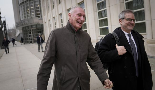 Former ESPN president John Skipper leaves federal court after testifying in a corruption case, Tuesday, Feb. 21, 2023, in New York. The trial in New York City is the latest development in a tangled corruption scandal that dates back nearly a decade and has ensnared more than three dozen executives and associates in the world&#x27;s most popular sport. (AP Photo/John Minchillo)