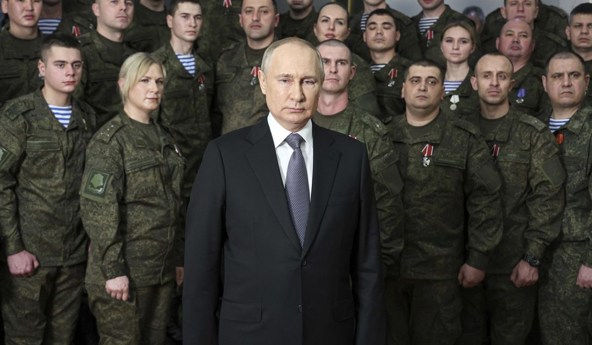 NextImg:In dueling speeches, Putin and Biden offer radically different visions of the fight to come