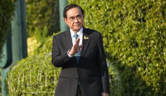 Thailand&#x27;s Prime Minister Prayuth Chan-ocha arrives at Malaysia&#x27;s Prime Minister Anwar Ibrahim at Government house in Bangkok, Thailand, Thursday, Feb. 9, 2023. Prayuth, who has declared he will seek another term in office, said Tuesday he will dissolve Parliament sometime in March, which would mean the general election will be likely be held on May 7. (AP Photo/Sakchai Lalit)