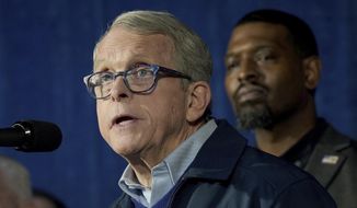 Ohio Gov. Mike DeWine speaks during a news conference in East Palestine, Ohio, Tuesday, Feb. 21, 2023. Environmental Protection Agency Administrator Michael Regan announced the agency will hold Norfolk Southern accountable for the costs of the cleanup of the Feb. 3 freight train derailment. (AP Photo/Matt Freed)