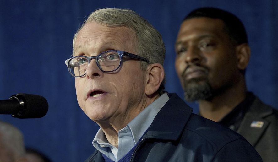 Ohio Gov. Mike DeWine speaks during a news conference in East Palestine, Ohio, Tuesday, Feb. 21, 2023. Environmental Protection Agency Administrator Michael Regan announced the agency will hold Norfolk Southern accountable for the costs of the cleanup of the Feb. 3 freight train derailment. (AP Photo/Matt Freed)