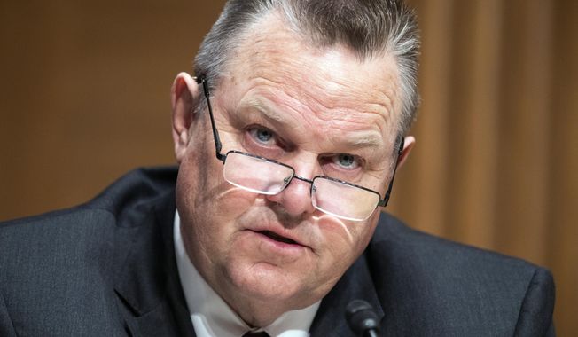 Sen. Jon Tester, D-Mont., questions Treasury Secretary Janet Yellen as she testifies before the Senate Banking, Housing, and Urban Affairs Committee hearing, Tuesday, May 10, 2022, on Capitol Hill in Washington. The Montana Democrat is expected to announce Wednesday, Feb. 22, 2023, that he will seek re-election to a fourth term.   (Tom Williams/Pool Photo via AP)
