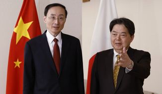 China&#x27;s Vice Minister of Foreign Affairs Sun Weidong, left, meets with Japan&#x27;s Foreign Minister Yoshimasa Hayashi at Foreign Ministry in Tokyo Wednesday, Feb. 22, 2023. (Issei Kato/Pool Photo via AP)