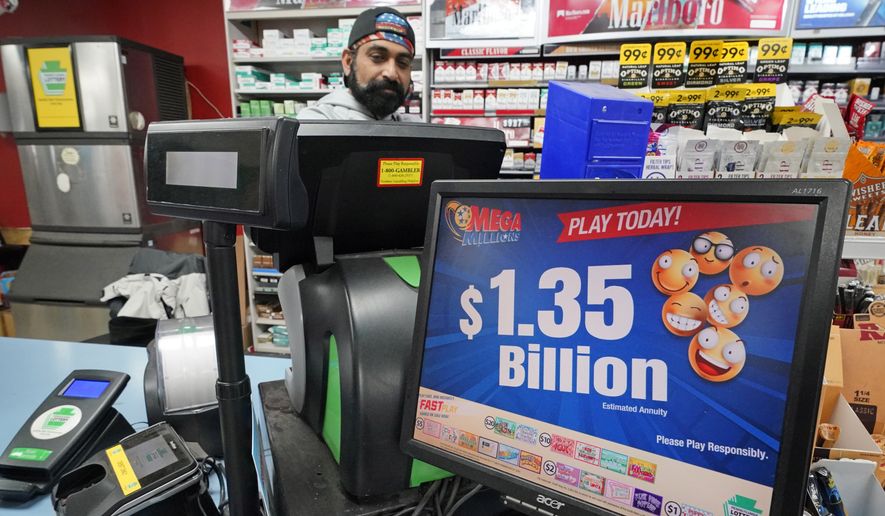A Mega Million sign displays the estimated jackpot of $1.35 Billion at the Cranberry Super Mini Mart in Cranberry, Pa., Jan. 12, 2023. The winner of a $1.35 billion Mega Millions jackpot has come forward to collect the prize. The Maine State Lottery announced Wednesday, Feb. 22, that the winner chose to remain anonymous and collect the cash option through a limited liability company instead of receiving the full amount in payments over time. (AP Photo/Gene J. Puskar, File)