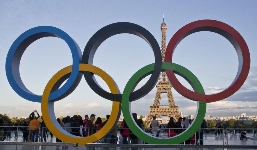 The Olympic rings are set up at Trocadero plaza that overlooks the Eiffel Tower, a day after the official announcement that the 2024 Summer Olympic Games will be in the French capital, in Paris, France, on Sept. 14, 2017. One year after the invasion of Ukraine began, Russia&#x27;s reintegration into the world of sports threatens to create the biggest rift in the Olympic movement since the Cold War.(AP Photo//Michel Euler, File)
