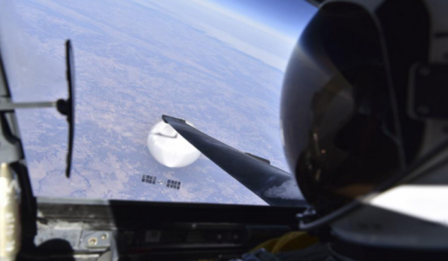A U.S. Air Force pilot looked down at the suspected Chinese surveillance balloon as it hovered over the Central Continental United States Feb. 3, 2023. The Defense Department and the Federal Aviation Administration have been tracking a balloon (not pictured) that was flying off the coast of Hawaii last week, but a defense official said Tuesday there&#x27;s no indication it is connected to China or any other adversary, and it presents no threats to aviation or national security. (Photo courtesy of the Department of Defense)