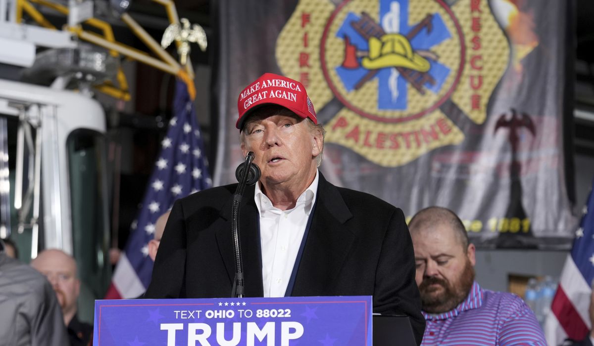 NextImg:Trump visits train derailment site in Ohio, dings Biden for being a no-show