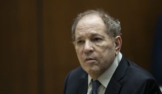 Former film producer Harvey Weinstein appears in court at the Clara Shortridge Foltz Criminal Justice Center in Los Angeles, Calif., on Oct. 4, 2022. A Los Angeles judge is scheduled to sentence the former movie mogul on Thursday, Feb. 23, 2023, to up to 18 years in prison after he was convicted in December of raping and sexually assaulting an Italian model and actor during a 2013 film festival. (Etienne Laurent/Pool Photo via AP, File)
