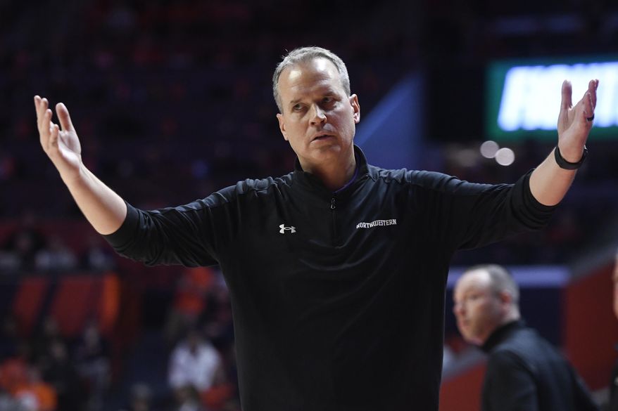 Northwestern coach Chris Collins reacts during the second half of the team&#x27;s NCAA college basketball game against Illinois, Thursday, Feb. 23, 2023, in Champaign, Ill. (AP Photo/Michael Allio)