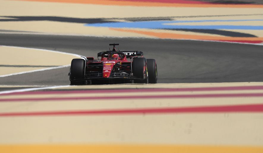 Ferrari driver Charles Leclerc of Monaco steers his car during a Formula One pre season test at the Bahrain International Circuit in Sakhir, Bahrain, Saturday, Feb. 25, 2023.(AP Photo/Frank Augstein)