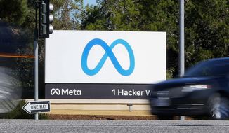 A car passes Facebook&#x27;s new Meta logo on a sign at the company headquarters on Oct. 28, 2021, in Menlo Park, Calif. The latest folding smartphones, immersive metaverse experiences, AI-powered chatbot avatars and other eye-catching technology are set to wow visitors at the annual MWC wireless trade fair. The four-day show, also known as Mobile World Congress, kicks off Monday in a vast Barcelona conference center. It&#x27;s the world’s biggest and most influential meeting for the mobile tech industry. (AP Photo/Tony Avelar, File)