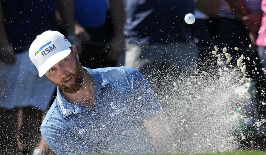 Chris Kirk hits from a bunker onto the third green during the final round of the Honda Classic golf tournament, Sunday, Feb. 26, 2023, in Palm Beach Gardens, Fla. (AP Photo/Lynne Sladky)