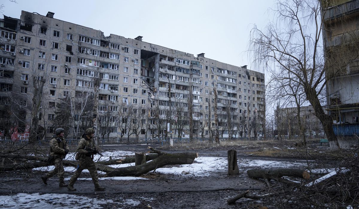 NextImg:On Ukraine front, civilians cling on as troops repel Russia