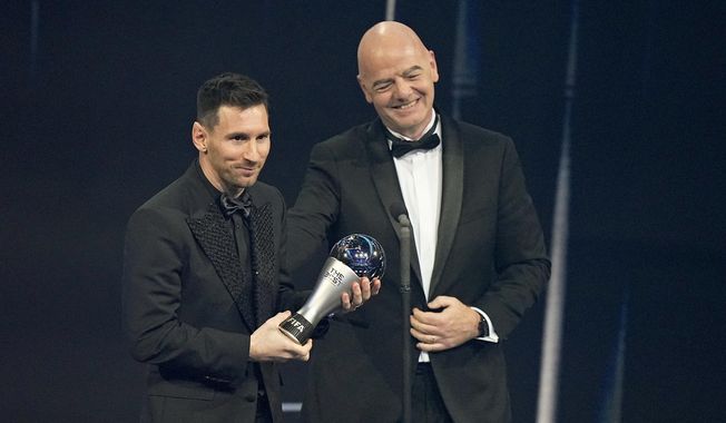 Argentina&#x27;s Lionel Messi receives the Best FIFA Men&#x27;s player award from FIFA president Gianni Infantino during the ceremony of the Best FIFA Football Awards in Paris, France, Monday, Feb. 27, 2023. (AP Photo/Michel Euler)