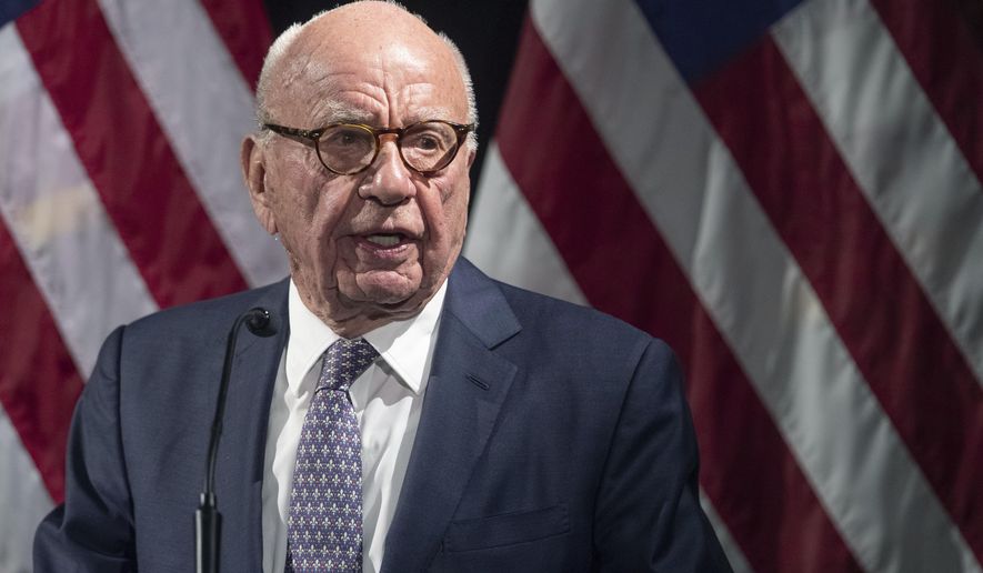 Rupert Murdoch introduces Secretary of State Mike Pompeo during the Herman Kahn Award Gala, Oct. 30, 2019, in New York. Murdoch, chairman of Fox Corp., acknowledged in a deposition that some Fox News commentators endorsed the false allegations by former President Donald Trump and his allies that the 2020 presidential election was stolen and that he did not step in to stop them from promoting the claims. The documents unsealed Monday, Feb. 27, 2023, are at the heart of a defamation lawsuit against the cable news giant by Dominion Voting Systems. (AP Photo/Mary Altaffer, File)