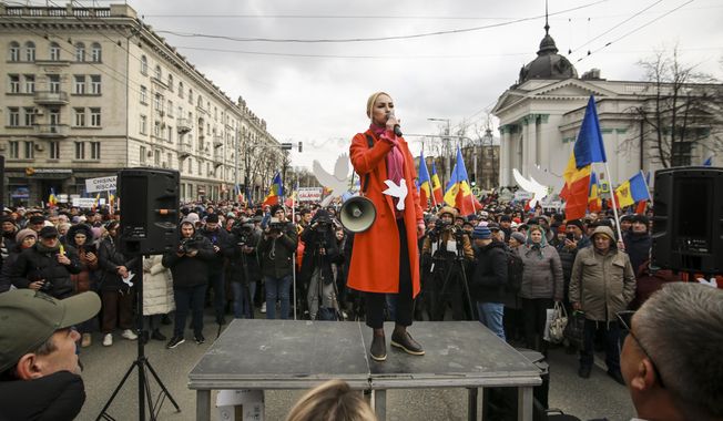 Marina Tauber the vice-president of Moldova&#x27;s Russia-friendly Shor Party speaks during a protest initiated by the Movement for the People and members of Moldova&#x27;s Russia-friendly Shor Party, against the pro-Western government and low living standards, in Chisinau, Moldova, Tuesday, Feb. 28, 2023. Thousands of protesters returned to Moldova&#x27;s capital Tuesday to demand that the country&#x27;snew pro-Western governmentfully subsidize citizens&#x27; winter energy bills amid skyrocketing inflation. (AP Photo/Aurel Obreja)