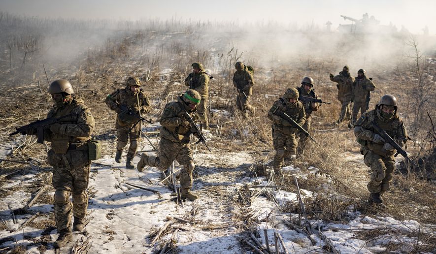 Ukrainian servicemen of the 3rd Separate Tank Iron Brigade take part in a drill, not far from the front lines, in the Kharkiv area, Ukraine, Thursday, Feb. 23, 2023. Grueling artillery battles have stepped up in recent weeks in the vicinity of Kupiansk, a strategic town on the eastern edge of Kharkiv province by the banks of the Oskil River as Russian attacks intensifying in a push to capture the entire industrial heartland known as the Donbas, which includes the Donetsk and the Luhansk provinces. (AP Photo/Vadim Ghirda) **FILE**