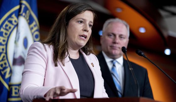 House Republican Conference Chair Rep. Elise Stefanik, R-N.Y., accompanied by House Majority Leader Steve Scalise, R-La., right, speaks at a news conference on Capitol Hill in Washington, Tuesday, June 15, 2021. (AP Photo/Andrew Harnik)