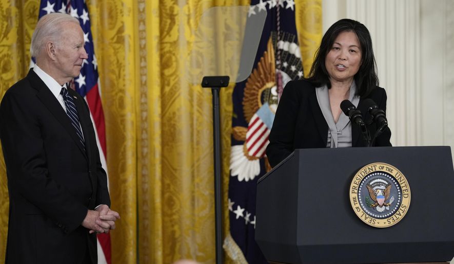 Julie Su, nominated by President Joe Biden, left, to serve as the Secretary of Labor, speaks during an event in the East Room of the White House in Washington, Wednesday, March 1, 2023. (AP Photo/Susan Walsh)