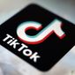 This photo shows a TikTok app logo in Tokyo on Sept. 28, 2020. In the latest salvo in the battle over the Chinese-owned video sharing app, Beijing says a ban on the use of TikTok by official European Union institutions will harm business confidence in Europe. (AP Photo/Kiichiro Sato, File)