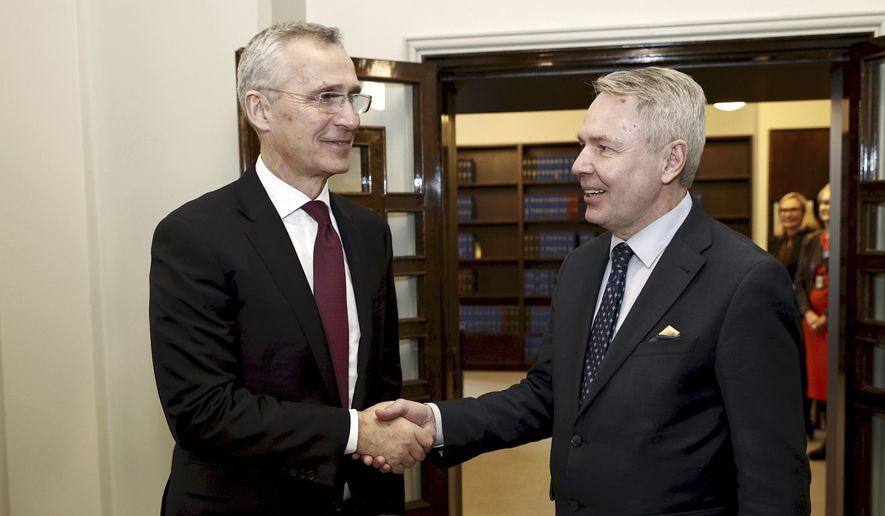 NATO Secretary-General Jens Stoltenberg, left, and Finnish Foreign Minister Pekka Haavisto meet at the Finnish Parliament in Helsinki, Finland, on Tuesday, Feb.28, 2023. Stoltenberg says membership for Finland and Sweden is “a top priority” for the military alliance and is urging members Turkey and Hungary which haven’t yet ratified the Nordic countries&#x27; accession to do so urgently. (Antti H&#x27;m&#x27;l&#x27;inen/Lehtikuva via AP)