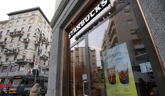 A Starbucks sign advertises the company&#x27;s Oleato coffee in one of their coffee shops in Milan, Italy, Monday, Feb. 27, 2023. Putting olive oil in coffee is hardly a tradition in Italy, but that didn&#x27;t stop Starbucks founder and CEO Howard Schultz from launching a series of beverages doing just that in Milan, the city that inspired his coffee house empire. (AP Photo/Antonio Calanni)