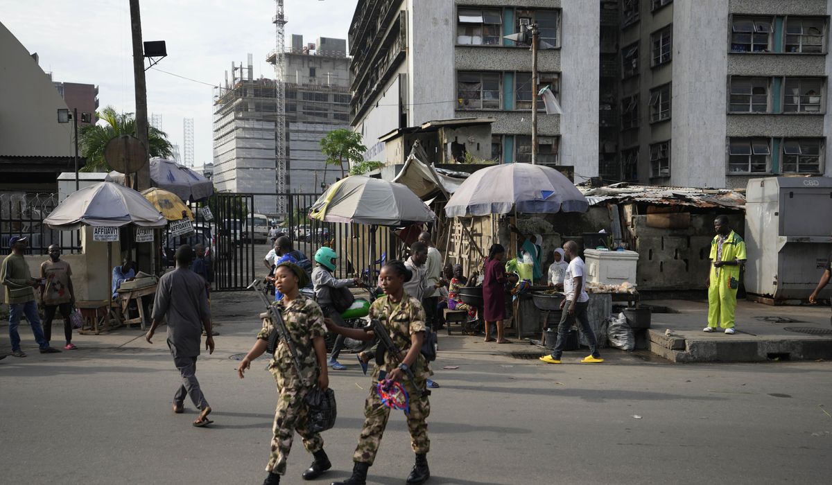 NextImg:Nigeria says 36 soldiers killed in an ambush by an armed group and a related helicopter crash