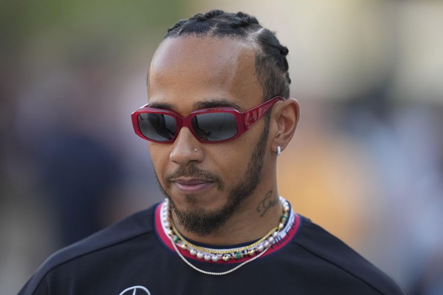 Mercedes driver Lewis Hamilton of Britain arrives for an interview at the Bahrain International Circuit in Sakhir, Bahrain, Thursday, March 2, 2023. The Bahrain GP will be held on Sunday March 5, 2023.(AP Photo/Frank Augstein)