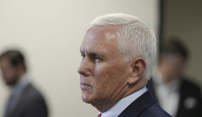 Former Vice President Mike Pence speaks with reporters following a roundtable discussion on police reform on Thursday, March 2, 2023, in North Charleston, S.C. (AP Photo/Meg Kinnard)