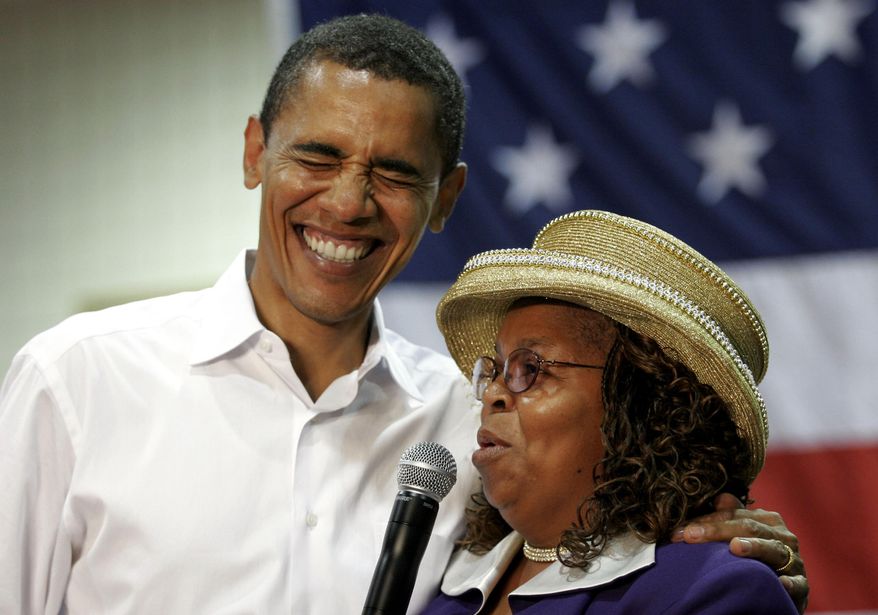 Presidential hopeful Sen. Barack Obama, D-Ill., left, laughs with Greenwood County, S.C., Council Woman, Edith Childs, right, in Aiken, S.C., on Oct. 6, 2007. Obama is marking the retirement of the South Carolina woman credited with popularizing the chant "Fired up, ready to go!" The chant came to epitomize Obama's two presidential campaigns. The former president says Childs' energy played a key role in lifting his spirits and his candidacy. (AP Photo/Brett Flashnick, File)