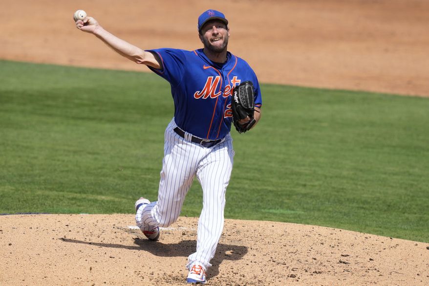 New York Mets starting pitcher Max Scherzer throws during the third inning of a spring training baseball game against the Washington Nationals, Friday, March 3, 2023, in Port St. Lucie, Fla. (AP Photo/Lynne Sladky)