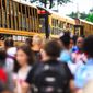 FILE - Students at Paducah Middle School get onto buses at the end of their first day of class on August 9, 2018, in Paducah, Ky. The Kentucky House passed a school discipline bill Friday, March 3, 2023, that&#x27;s aimed at defusing classroom disruptions by allowing teachers to take immediate action to remove unruly students. (Ellen O&#x27;Nan/The Paducah Sun via AP, File)