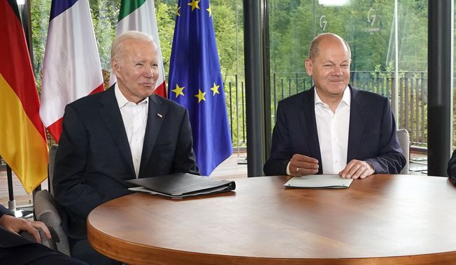 President Joe Biden and German Chancellor Olaf Scholz meet on the sidelines of the G7 summit at Castle Elmau in Kruen, near Garmisch-Partenkirchen, Germany, on June 28, 2022. Scholz is visiting the White House on Friday, March 3, 2023, to meet with Biden. (AP Photo/Susan Walsh, File)