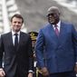 French President Emmanuel Macron, left, is greeted by Democratic Republic of the Congo President Felix Tshisekedi in Kinshasa Saturday March 4, 2023. Macron, on the last leg of an ambitious Africa trip that took him to Gabon, Angola, the Republic of Congo and Congo, wants to roll out more ambitious economic policies, in a bid to boost France&#x27;s waning influence in the continent (AP Photo/Samy Ntumba Shambuyi)