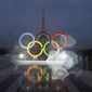 The Olympic rings are seen on the Place du Trocadero that overlooks the Eiffel Tower, after the vote in Lima, Peru, awarding the 2024 Games to the French capital, in Paris, Sept. 13, 2017. Organizers of the Paris 2024 Olympics promised Games with a relatively modest price tag and &quot;egalitarian&quot; access to events, thanks to an online draw meant to revolutionize ticket sales and bring the masses to next year&#x27;s Olympics with prices as low as 24 euros ($26). But as the first round of ticketing winds down, many &quot;lucky&quot; winners chosen for the draw are feeling frustrated, angry and cheated, as their only option during the 48-hour purchasing window was paying at least 200 euros per ticket for the few remaining events on offer. (AP Photo/Francois Mori, File)