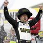 William Byron celebrates in Victory Lane after winning a NASCAR Cup Series auto race on Sunday, March 5, 2023, in Las Vegas. (AP Photo/Ellen Schmidt)