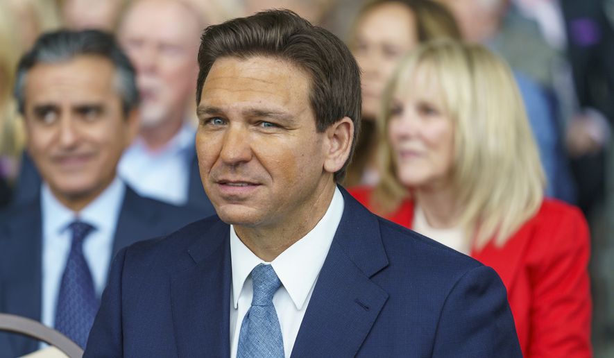 Florida Republican Gov. Ron DeSantis sits with his family before addressing supporters at The Ronald Reagan Presidential Library in Simi Valley, Calif., Sunday, March 5, 2023. DeSantis has quietly begun to expand his political coalition on his terms just as he releases a book, &quot;The Courage to be Free,&quot; which comes out Tuesday. (AP Photo/Damian Dovarganes)