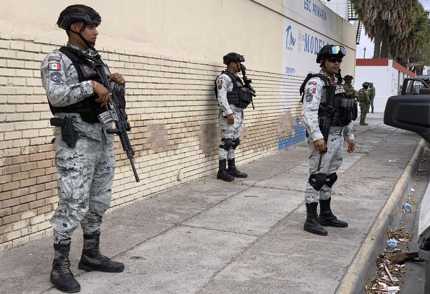 Mexican Natioanla Guard prepare a search mission for four U.S. citizens kidnapped by gunmen at Matamoros, Mexico, Monday, March 6, 2023. Mexican President Andres Manuel Lopez Obrador said the four Americans were going to buy medicine and were caught in the crossfire between two armed groups after they had entered Matamoros, across from Brownsville, Texas, on Friday. (AP Photo)