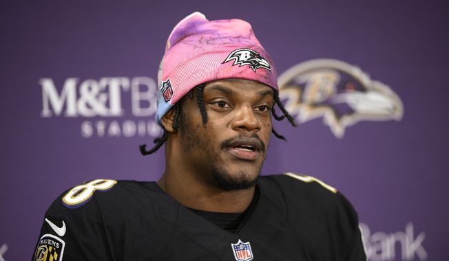 Baltimore Ravens quarterback Lamar Jackson speaks to the media at a press conference after an NFL football game against the Cincinnati Bengals, Oct. 9, 2022, in Baltimore. The Baltimore Ravens announced Tuesday, March 7, 2023, that they were designating Jackson as their franchise player, preventing him from becoming an unrestricted free agent this month after the expiration of his rookie contract. (AP Photo/Nick Wass, File) **FILE**