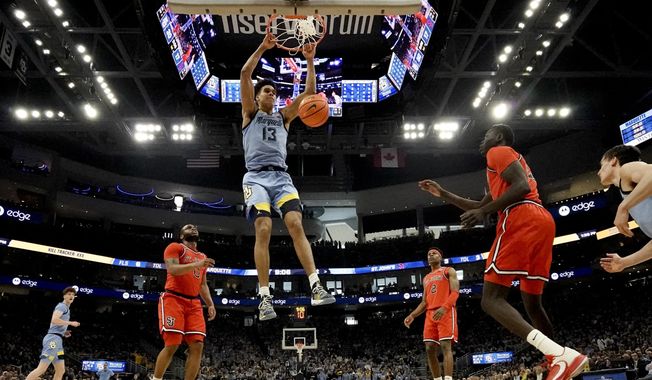 Marquette&#x27;s Oso Ighodaro dunks during the first half of an NCAA college basketball game against St. John&#x27;s Saturday, March 4, 2023, in Milwaukee. Marquette won 96-94. (AP Photo/Morry Gash) **FILE**