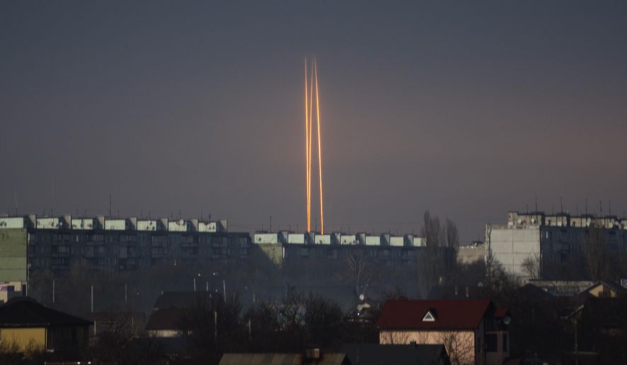 Three Russian rockets launched against Ukraine from Russia&#x27;s Belgorod region are seen at dawn in Kharkiv, Ukraine, late Thursday, March 9, 2023. (AP Photo/Vadim Belikov) ** FILE **