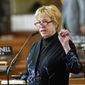 FILE - Nebraska state Sen. Lou Ann Linehan of Elkhorn speaks during debate in Lincoln, Neb., May 7, 2019. Nebraska could join 48 other states in offering public money for private school tuition under a bill advanced by the state Legislature on Wednesday, March 8, 2023, even as some lawmakers expressed concern about taxpayer dollars going to private schools allowed to turn away students based on religious tenets. (AP Photo/Nati Harnik, File)