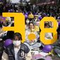 Participants hold signs representing International Women&#x27;s Day during a rally in Seoul, South Korea, Wednesday, March 8, 2023. (AP Photo/Lee Jin-man)