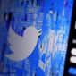 The Twitter splash page is seen on a digital device on April 25, 2022, in San Diego. (AP Photo/Gregory Bull) **FILE**