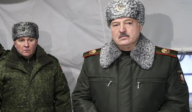 Belarusian President Alexander Lukashenko, right, and Defense Minister Viktor Khrenin attend a meeting with military top officials at the Obuz-Lesnovsky training ground, Belarus, on Jan. 6, 2023. Lukashenko said Monday Feb. 20, 2023 that the ex-Soviet nation will form a new territorial defense force amid the fighting in neighboring Ukraine. (Nikolai Petrov/BelTA Pool Photo via AP, File)