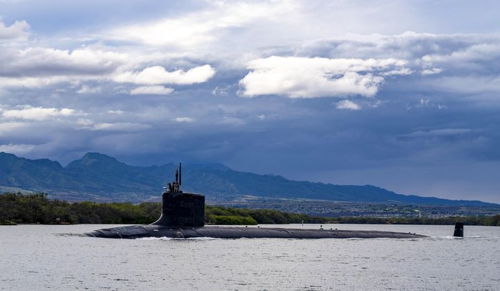 In this photo provided by U.S. Navy, the Virginia-class fast-attack submarine USS Missouri (SSN 780) departs Joint Base Pearl Harbor-Hickam for a scheduled deployment in the 7th Fleet area of responsibility, Sept. 1, 2021. Australia will purchase U.S.-manufactured, Virginia-class nuclear-powered attack submarines to modernize its fleet, a European official and a person familiar with the matter said Thursday, March 9, 2023, amid growing concerns about China&#x27;s influence in the Indo-Pacific region. (Amanda R. Gray/U.S. Navy via AP, File)